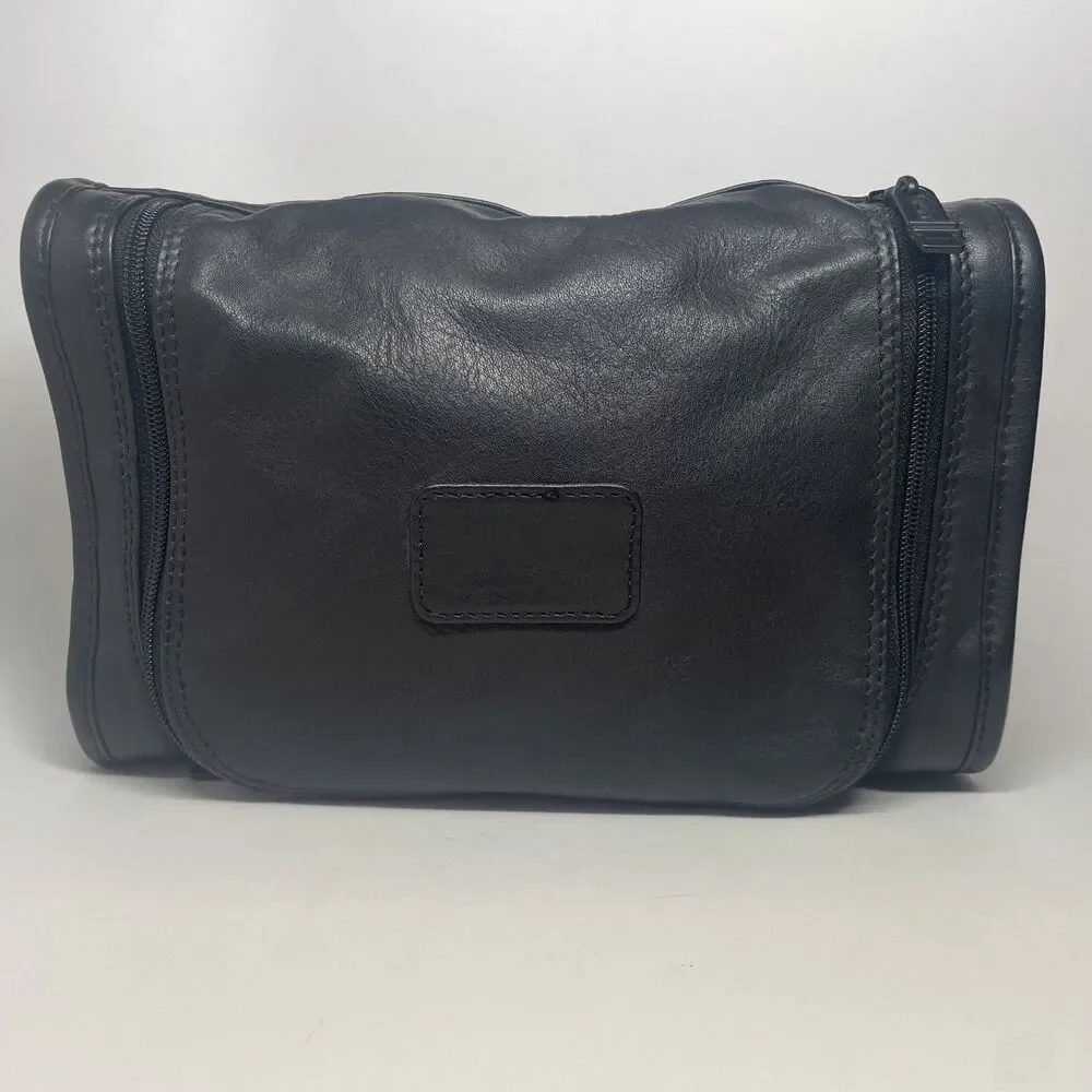 Tumi black leather